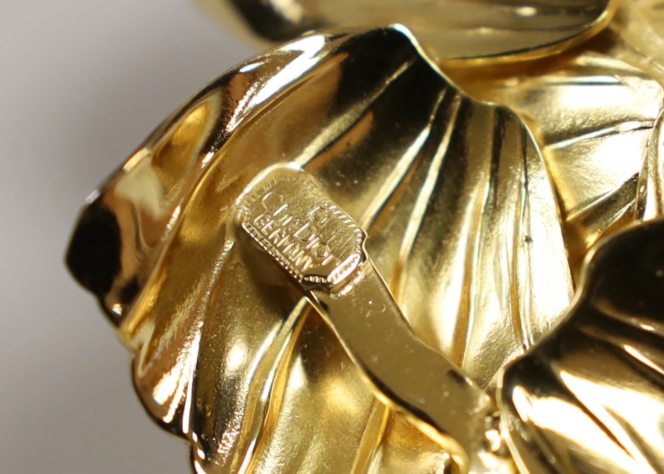 A Christian Dior costume rose brooch, 6cm, in box and a small group of sterling, white metal and costume jewellery, including Ortak Longship brooch.